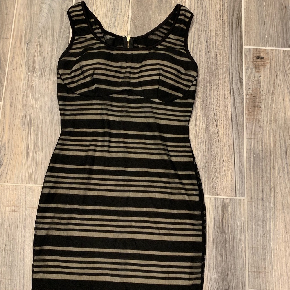 🔥 Super sexy little black dress w/ a nude lining